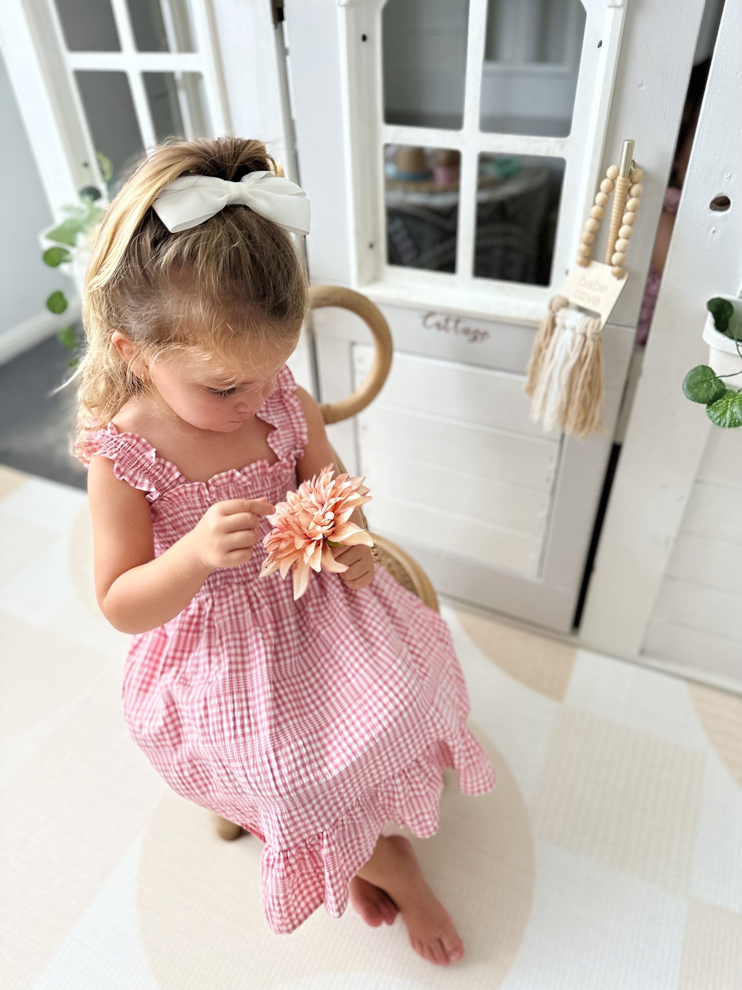 Milky Mae Sweetheart Sundress featuring delicate ruffle straps and a classic pink and white gingham pattern