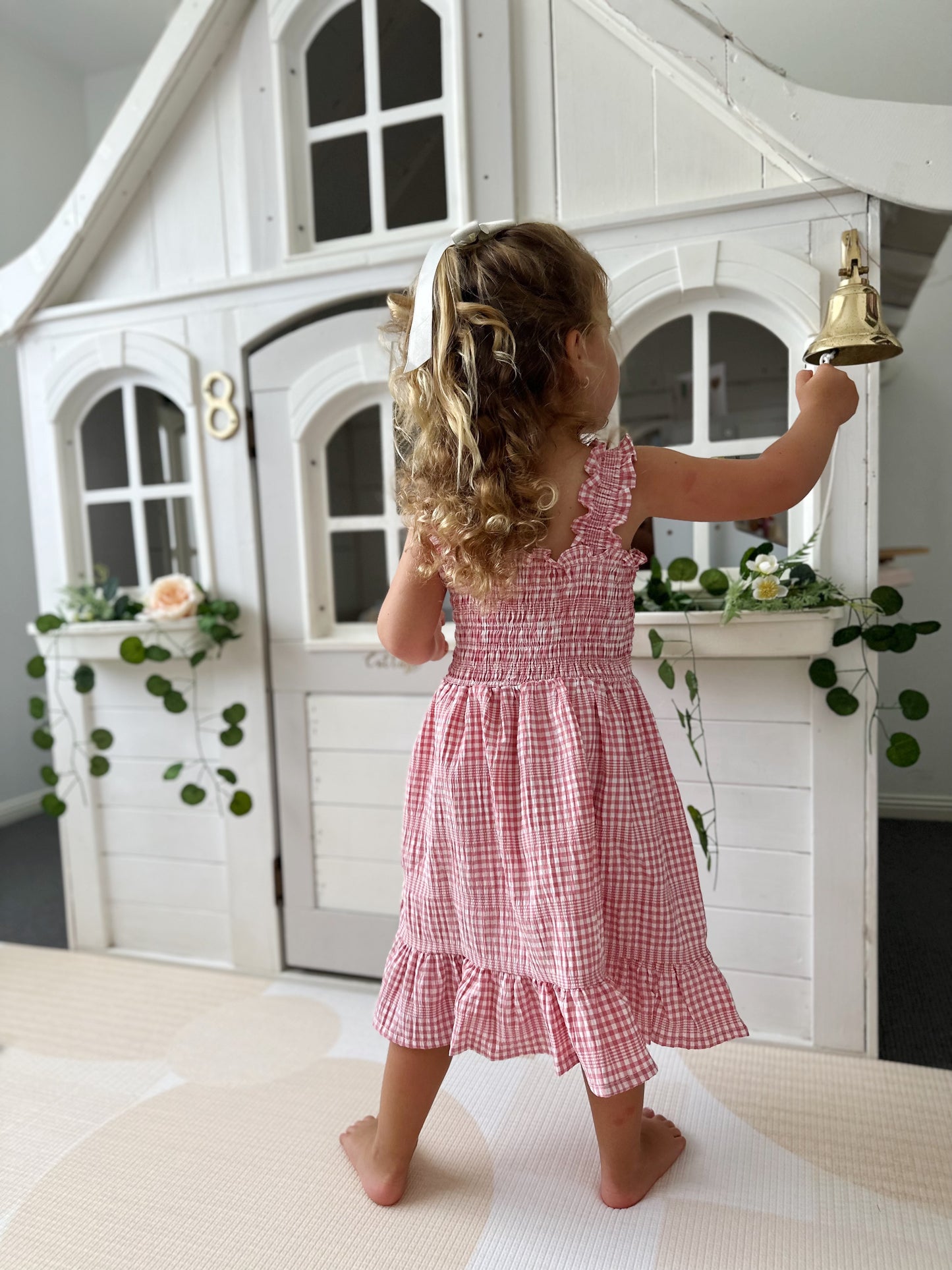 Milky Mae Sweetheart Sundress featuring delicate ruffle straps and a classic pink and white gingham pattern