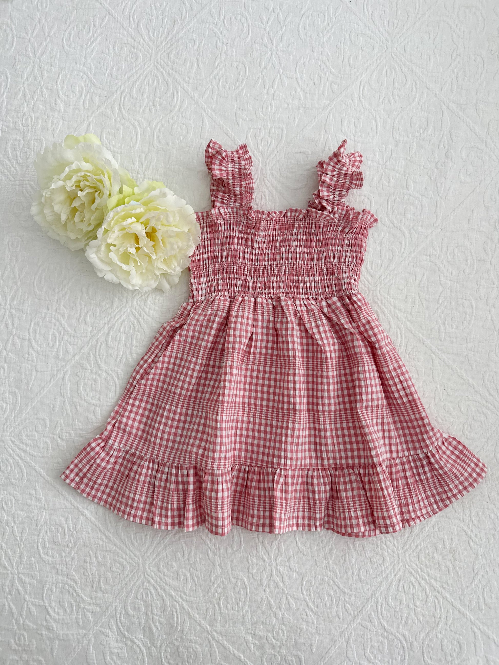 Milky Mae Sweetheart Sundress featuring delicate ruffle straps and a classic pink and white gingham pattern