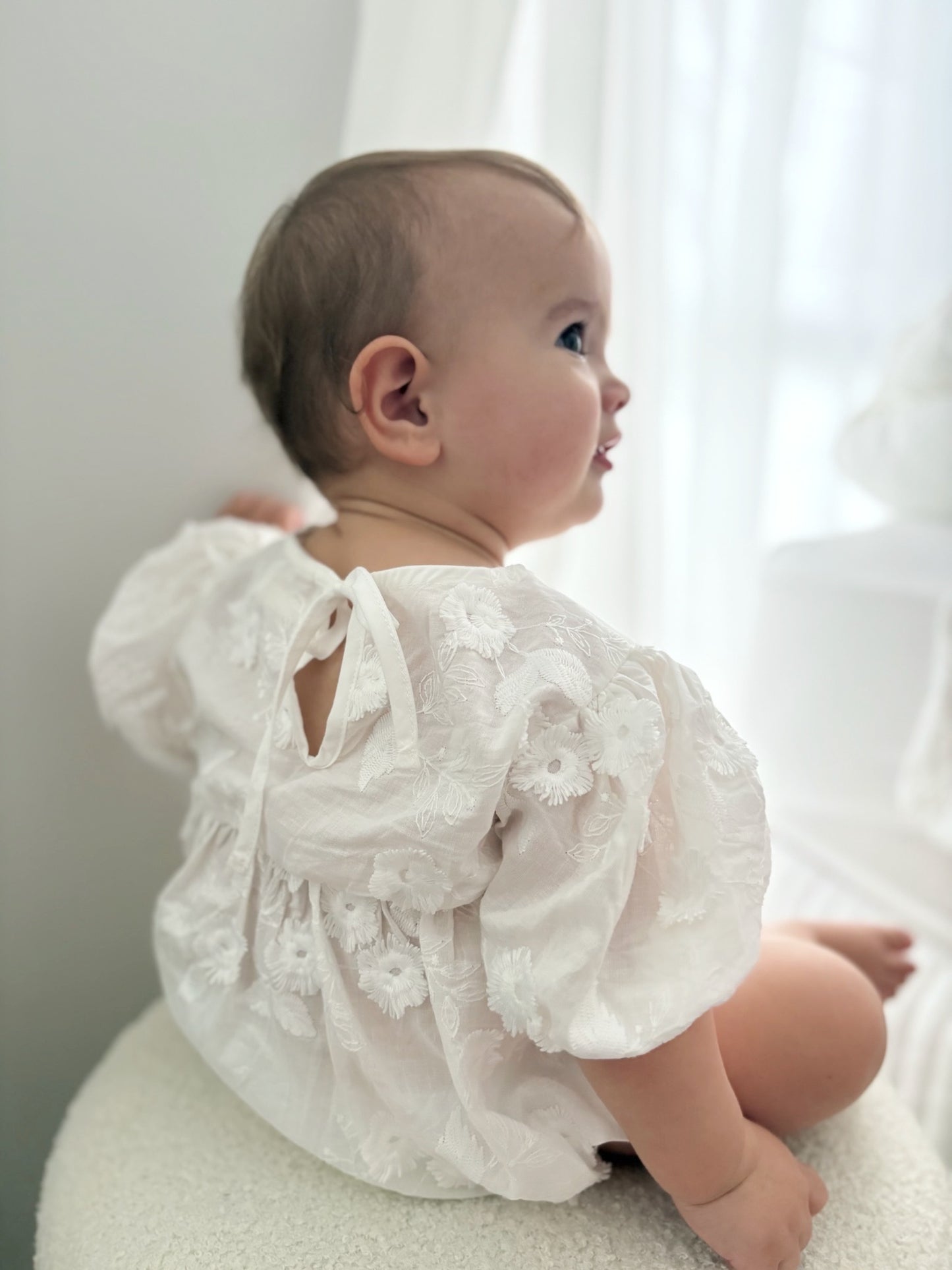 Milky Mae Elaina Romper in cotton fabric with delicate embroidered flowers 
